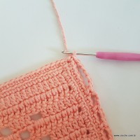 Fixação da alça no canto do tapete